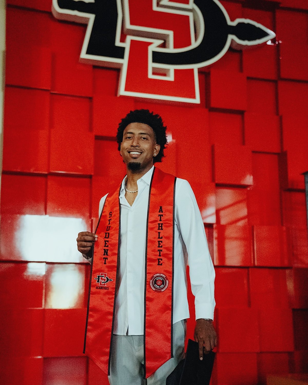 Desai Lopez graduation portrait